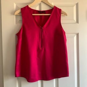Medium bright pink top with zipper detail and textured pattern